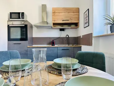 Küche/Küchenzeile in der Unterkunft Apartment Daniel - Stilvolle Wohnung mit Veranda für 4 Personen