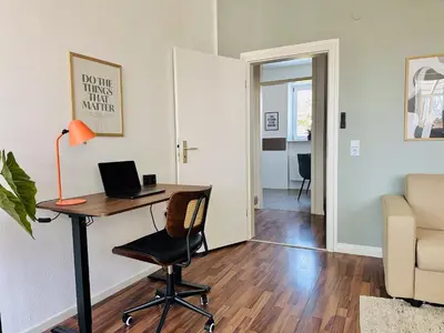 Ein Sitzbereich in der Unterkunft Apartment Daniel - Stilvolle Wohnung mit Veranda für 4 Personen