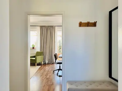 Ein Sitzbereich in der Unterkunft Apartment Daniel - Stilvolle Wohnung mit Veranda für 4 Personen