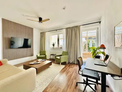 Ein Sitzbereich in der Unterkunft Apartment Daniel - Stilvolle Wohnung mit Veranda für 4 Personen