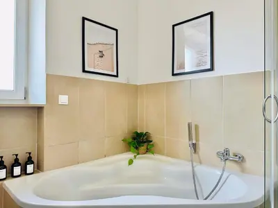 Ein Badezimmer in der Unterkunft Apartment Daniel - Stilvolle Wohnung mit Veranda für 4 Personen