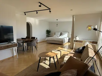 TV/Unterhaltungsangebot in der Unterkunft Flow Living I Penthouse mit Dachterrasse I 5 Min zum Ammersee