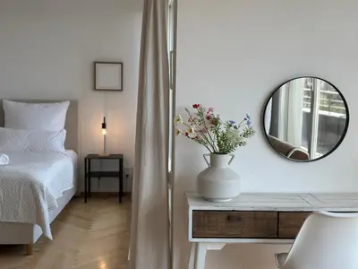 Ein Bett oder Betten in einem Zimmer der Unterkunft Flow Living I Penthouse mit Dachterrasse I 5 Min zum Ammersee
