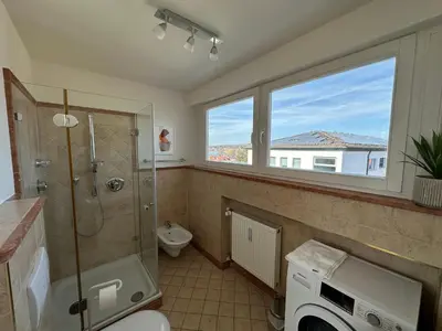 Ein Badezimmer in der Unterkunft Flow Living I Penthouse mit Dachterrasse I 5 Min zum Ammersee