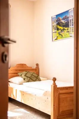 Ein Bett oder Betten in einem Zimmer der Unterkunft Würmtalhof Pension & Wirtshaus
