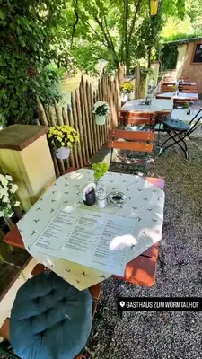 Ein Garten an der Unterkunft Würmtalhof Pension & Wirtshaus