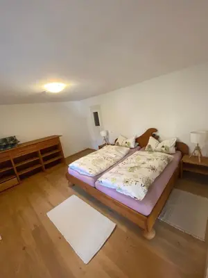 Ein Bett oder Betten in einem Zimmer der Unterkunft Ferienwohnung Witt