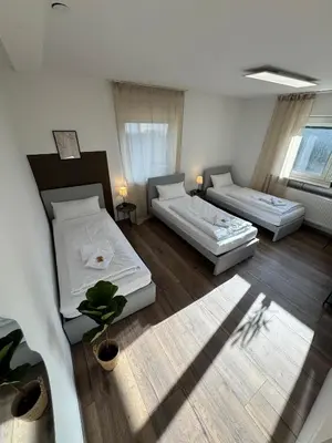 Ein Bett oder Betten in einem Zimmer der Unterkunft Bavaria Home - no 5