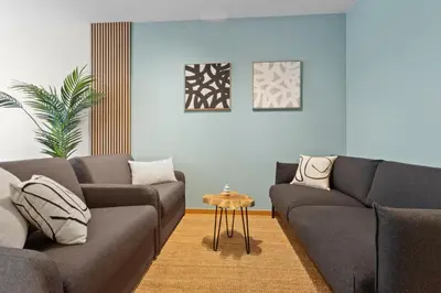 Ein Sitzbereich in der Unterkunft Flatista Homes - Nymphenburg Suites