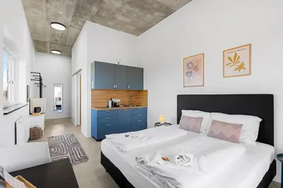 Ein Bett oder Betten in einem Zimmer der Unterkunft Moderne Apartments mit Küche, WLAN & Parkplatz - ruhige Lage