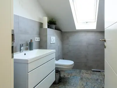 Ein Badezimmer in der Unterkunft 2 Ferienwohnungen in Aufhausen - die Sternengucker-Wohnung im 5-Seen-Land
