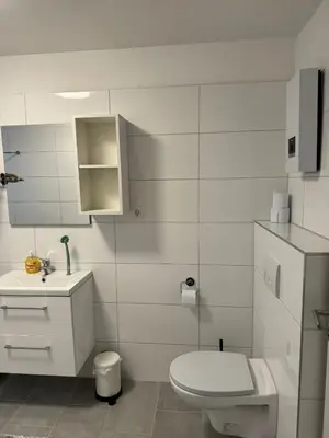 Ein Badezimmer in der Unterkunft TopLageEG