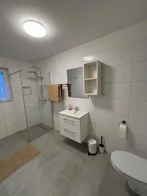Ein Badezimmer in der Unterkunft TopLageEG