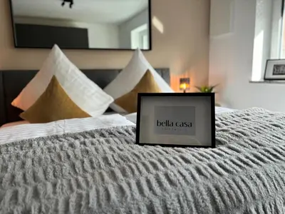 Ein Bett oder Betten in einem Zimmer der Unterkunft bella casa Allgäu Apartments