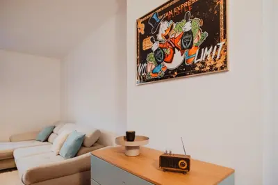 Ein Sitzbereich in der Unterkunft Zentral, Loggia, TG-Platz