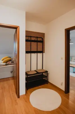 Ein Bett oder Betten in einem Zimmer der Unterkunft Zentral, Loggia, TG-Platz