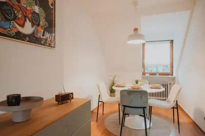 Ein Sitzbereich in der Unterkunft Zentral, Loggia, TG-Platz