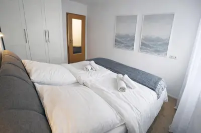 Ein Bett oder Betten in einem Zimmer der Unterkunft Osterurlaub im Alpenidyll für 4 mit Sonnenterrasse