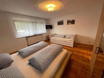 Ein Bett oder Betten in einem Zimmer der Unterkunft Zum Fröhlich