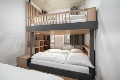Ein Bett oder Betten in einem Zimmer der Unterkunft Homaris Apartments Isartor