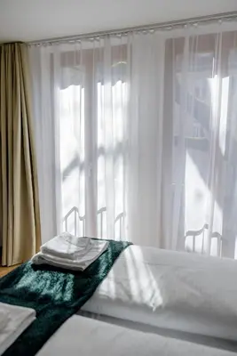Ein Bett oder Betten in einem Zimmer der Unterkunft Lumen Homes - Altstadt-Residenz, direkt im Zentrum, geräumiges Apartment mit 5 Zimmern, Küche
