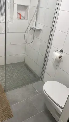 Ein Badezimmer in der Unterkunft TopLageDG