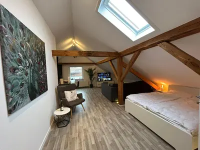 Ein Bett oder Betten in einem Zimmer der Unterkunft Perfekt für 2-4! Küche Garage S-Bahnhof Flughafen