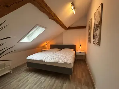Ein Bett oder Betten in einem Zimmer der Unterkunft Perfekt für 2-4! Küche Garage S-Bahnhof Flughafen