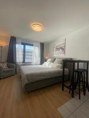 Ein Bett oder Betten in einem Zimmer der Unterkunft Hotel Room at Munich Central Station