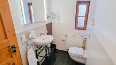 Ein Badezimmer in der Unterkunft schönes Ferienhaus mit Sauna im Grünen