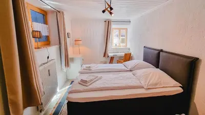 Ein Bett oder Betten in einem Zimmer der Unterkunft schönes Ferienhaus mit Sauna im Grünen