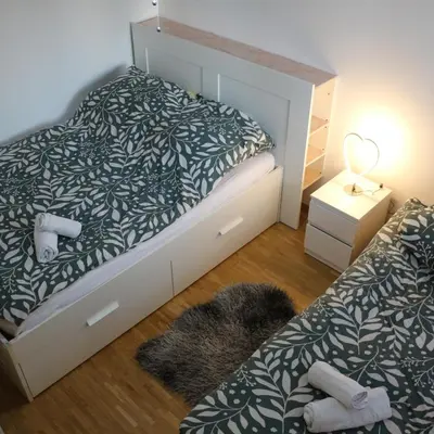Ein Bett oder Betten in einem Zimmer der Unterkunft München Haus xx Centrum xx Messe xx Oktoberfest xx