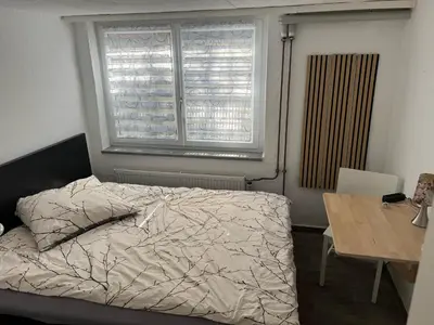 Ein Bett oder Betten in einem Zimmer der Unterkunft München Haus xx Centrum xx Messe xx Oktoberfest xx