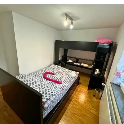 Ein Bett oder Betten in einem Zimmer der Unterkunft München Haus xx Centrum xx Messe xx Oktoberfest xx