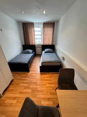 Ein Bett oder Betten in einem Zimmer der Unterkunft Apartments Haar