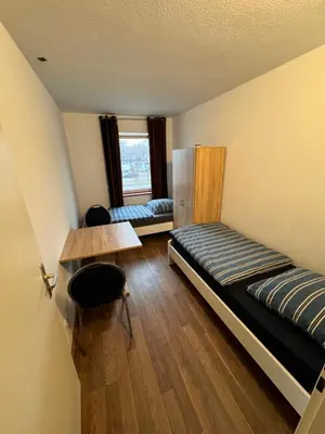 Ein Bett oder Betten in einem Zimmer der Unterkunft Apartments Haar
