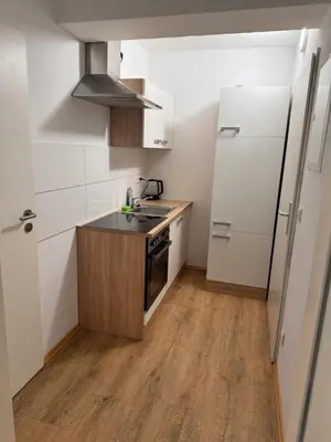 Küche/Küchenzeile in der Unterkunft Apartments Haar