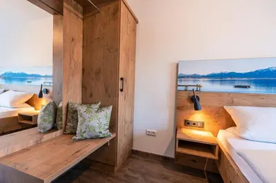 Ein Bett oder Betten in einem Zimmer der Unterkunft Gäste- und Apartmenthaus Wiesholler