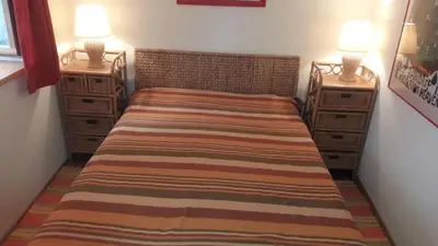 Ein Bett oder Betten in einem Zimmer der Unterkunft Der Aicher zu Chieming