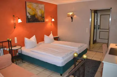 Ein Bett oder Betten in einem Zimmer der Unterkunft Gasthaus Gästekiste