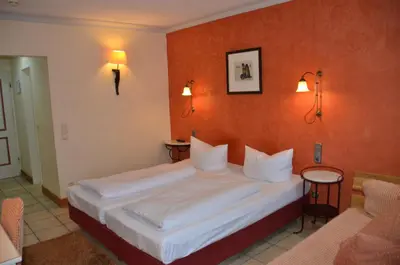 Ein Bett oder Betten in einem Zimmer der Unterkunft Gasthaus Gästekiste