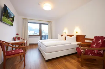 Ein Bett oder Betten in einem Zimmer der Unterkunft Gästehaus Zugspitz - Zimmer ohne Verpflegung