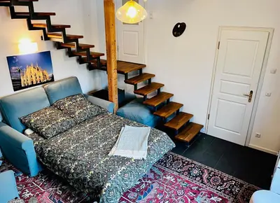 Ein Bett oder Betten in einem Zimmer der Unterkunft Munich Maisonette