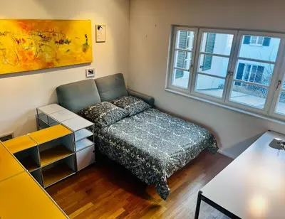 Ein Bett oder Betten in einem Zimmer der Unterkunft Munich Maisonette