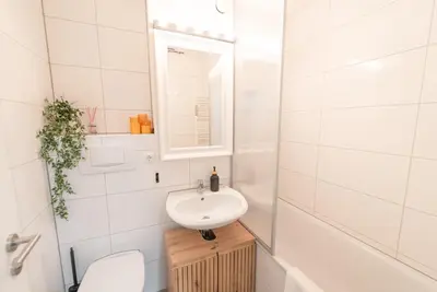 Ein Badezimmer in der Unterkunft Zentrales Apartment mit Balkon direkt am Wanderweg - Alpenperle Tegernsee