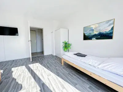Ein Bett oder Betten in einem Zimmer der Unterkunft Monteurswohnungen in Augsburg und Umgebung