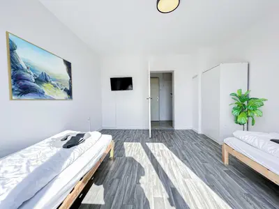 Ein Bett oder Betten in einem Zimmer der Unterkunft Monteurswohnungen in Augsburg und Umgebung