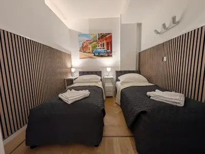 Ein Bett oder Betten in einem Zimmer der Unterkunft Munich Top Place direkt am Karlsplatz - Stachus 70 qm mit 2 Schlafzimmer Apartment Mila