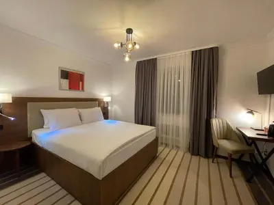 Ein Bett oder Betten in einem Zimmer der Unterkunft Hotel Casa Andalucia