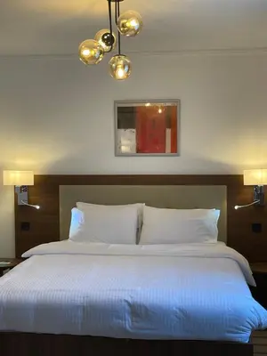 Ein Bett oder Betten in einem Zimmer der Unterkunft Hotel Casa Andalucia